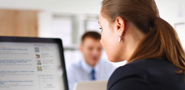 Businesswoman talking to couple