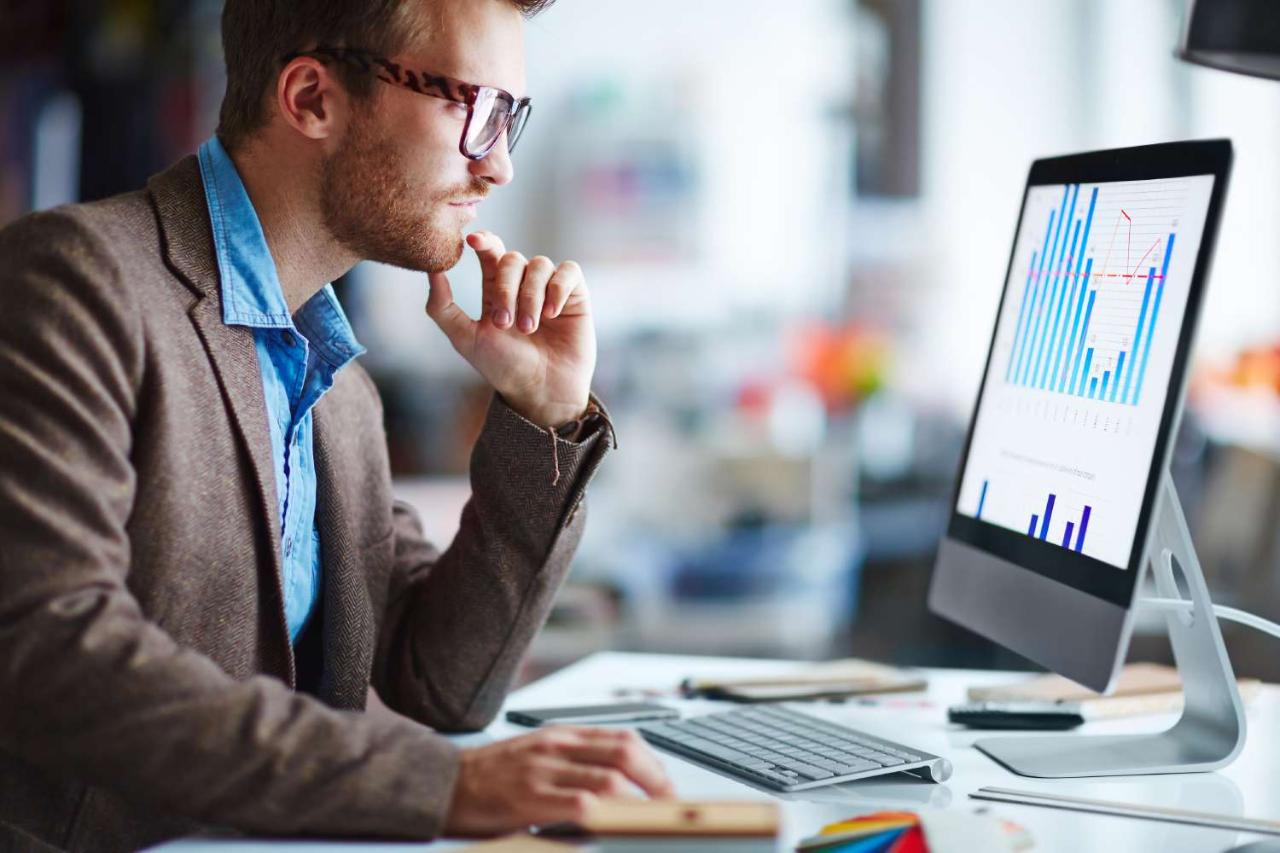 Man looking at computer screen