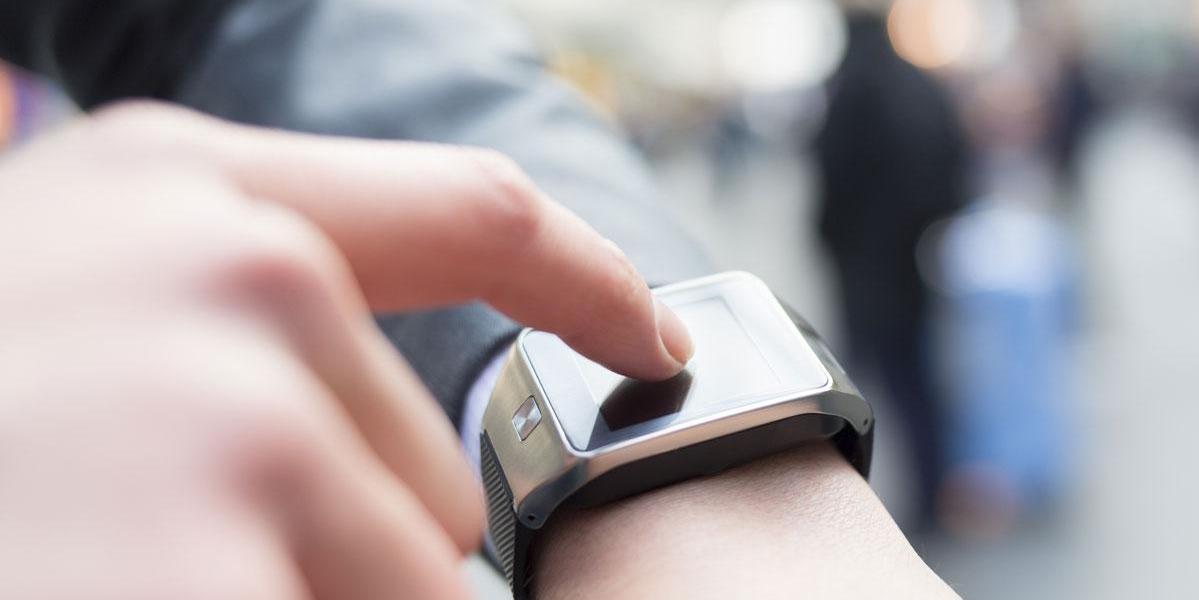 Person touching watch Person touching watch