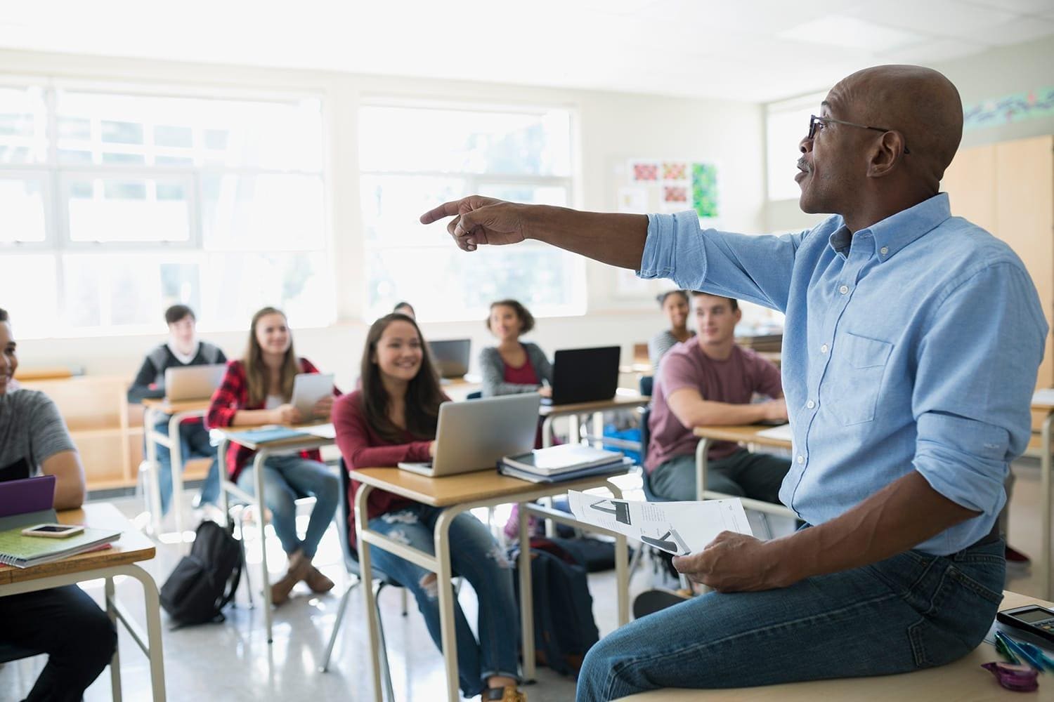 Educator teaching classroom of students