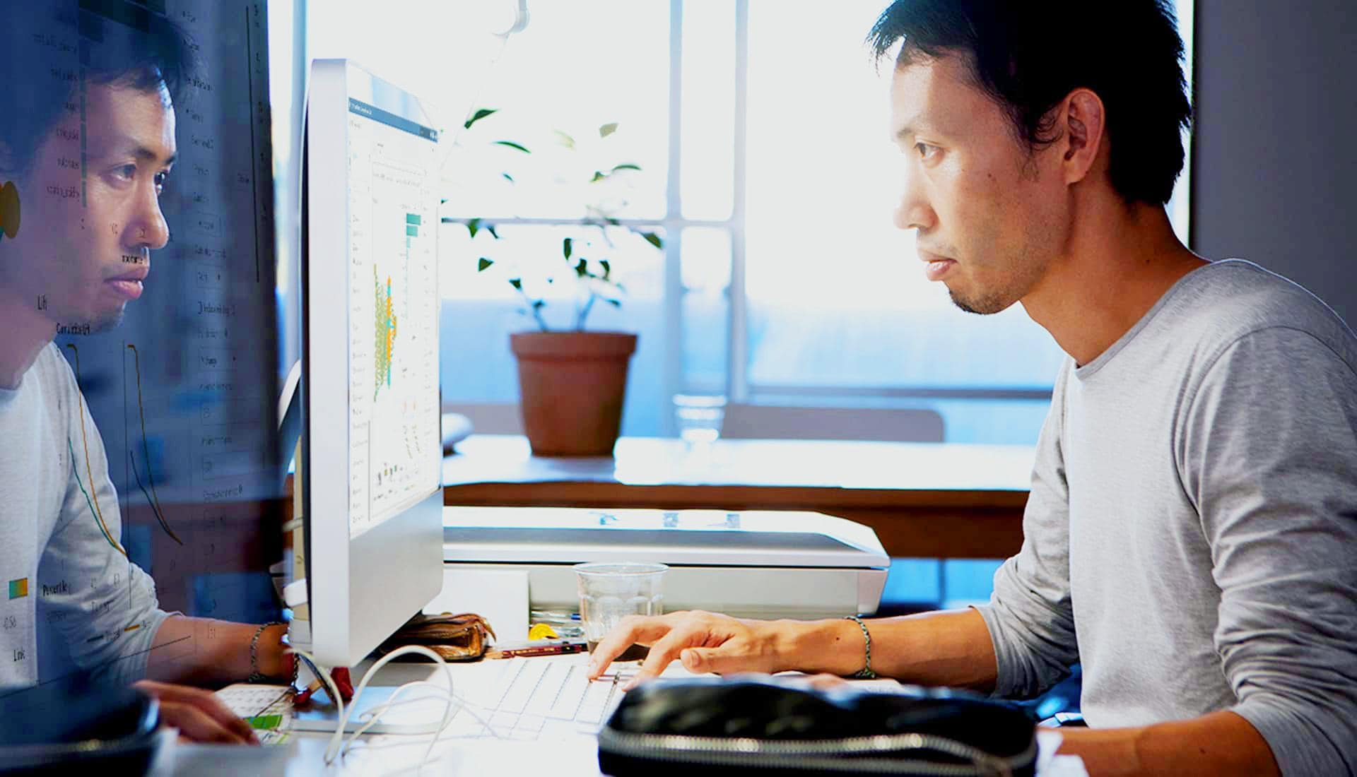 data scientist working on a computer
