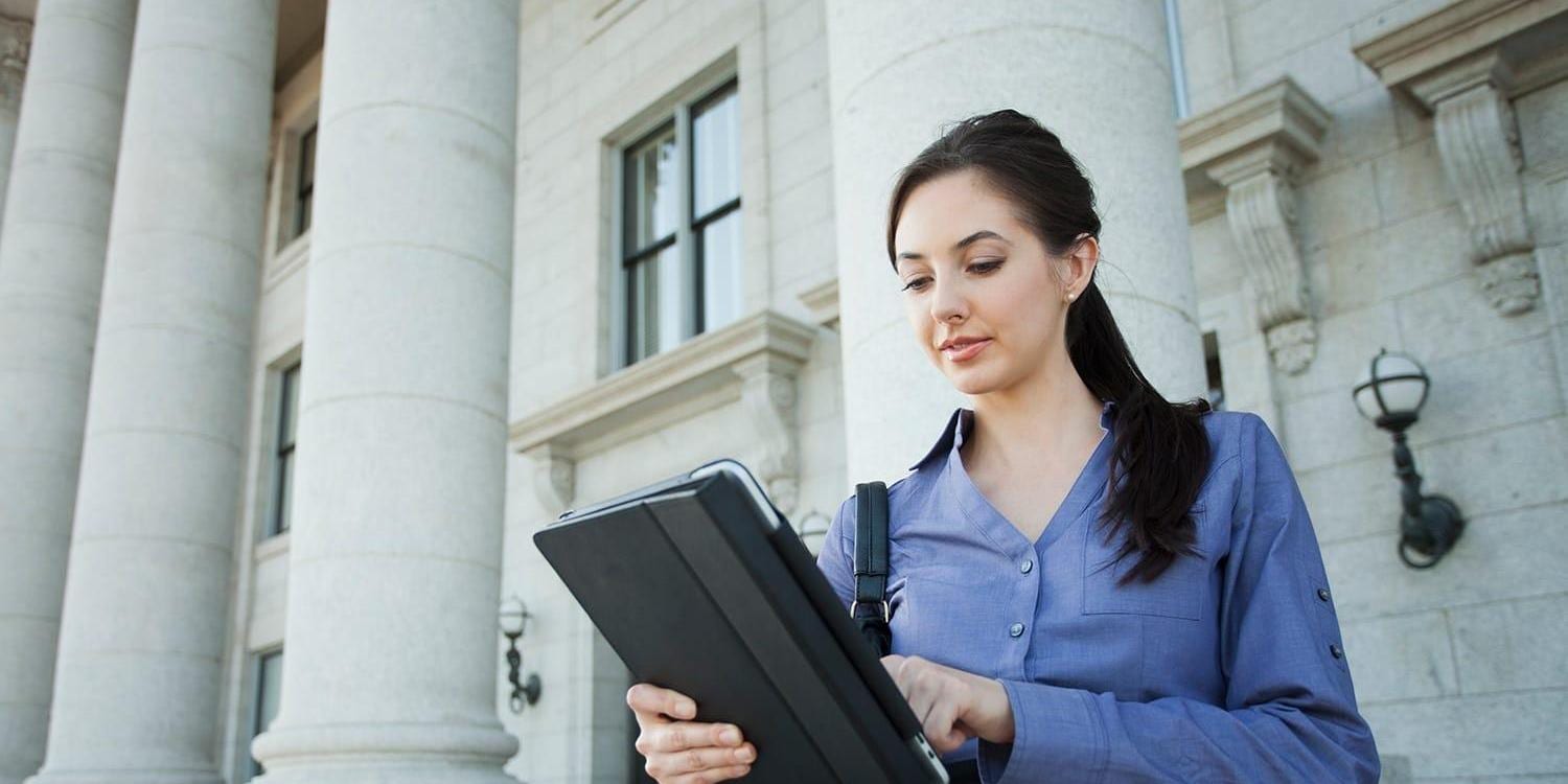 Woman in front of government building