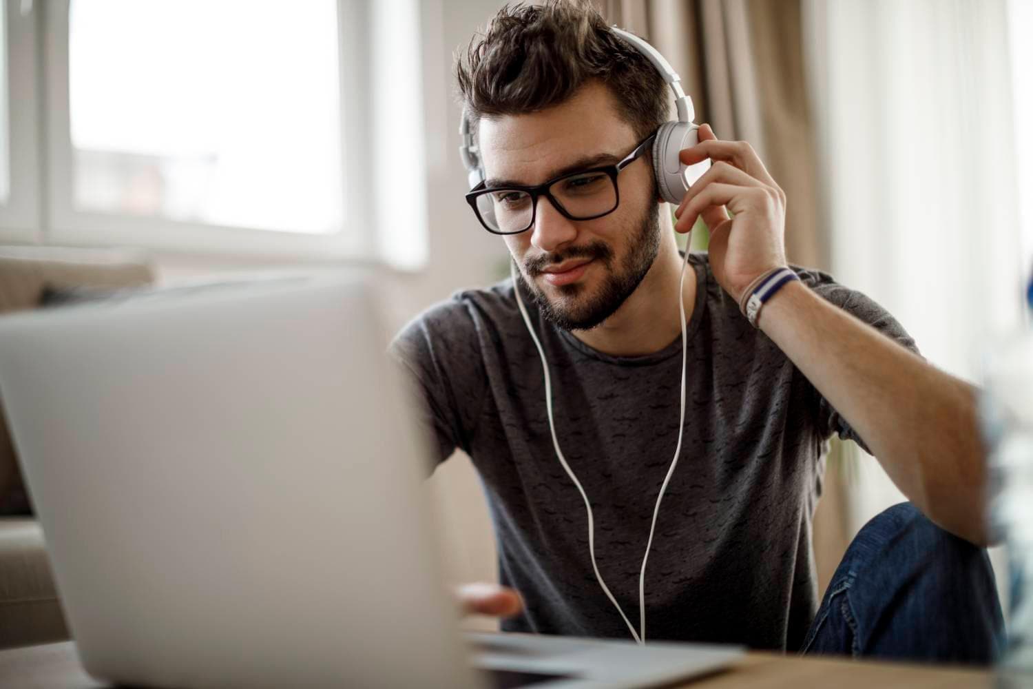 Man watching video on laptop
