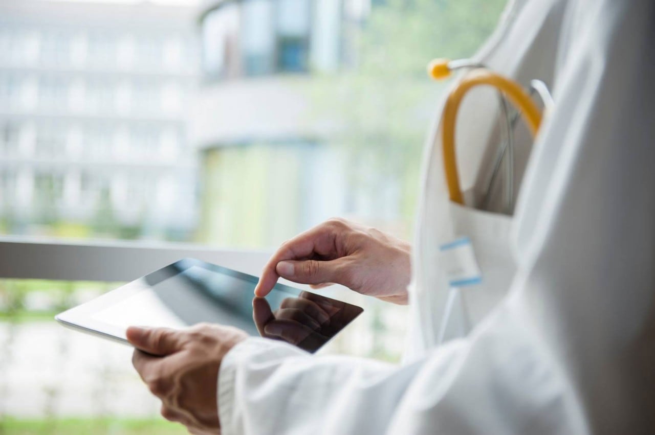 doctors arms with tablet doctors arms with tablet