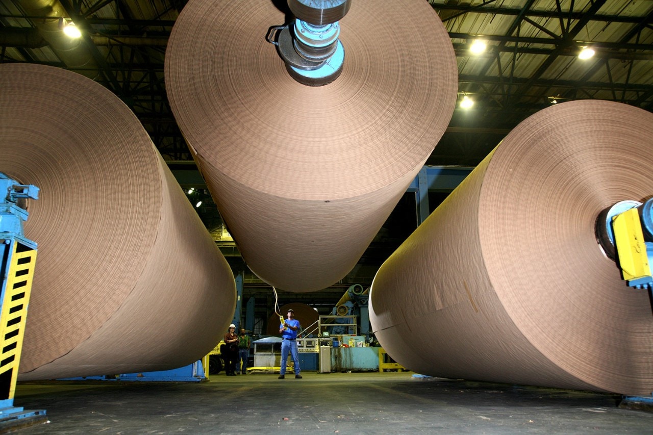 Large factory with person working