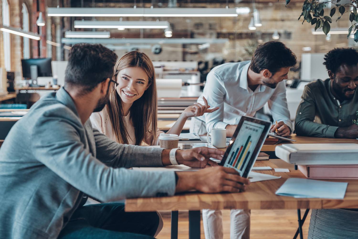 Group of young people working in office