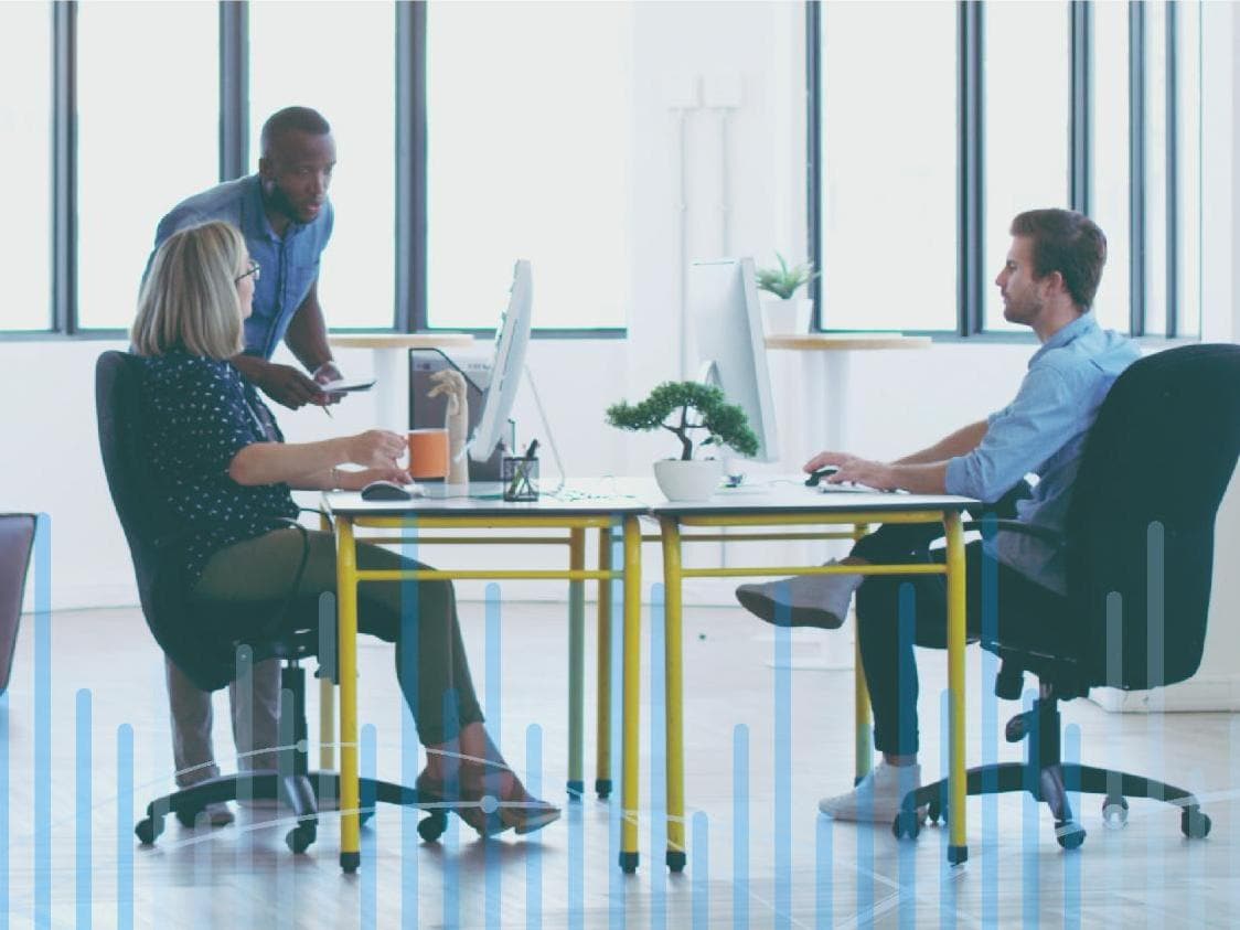 Group of co-workers in office setting
